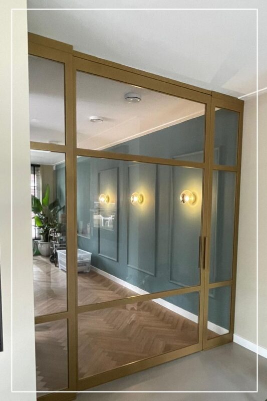 skygate-maatwerk-dubbele-stalen-schuifpui-brons
