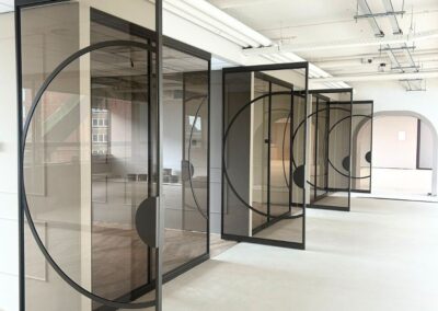 Design stalen taatsdeur met brons glas – Skygate Amsterdam.